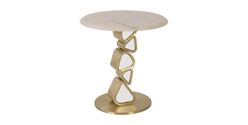 A Phillip's Collection accent table with mirrored pebble shapes in the base